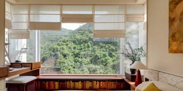 Las exuberantes colinas de Hong Kong informan apartamentos modelo de Studio Ella