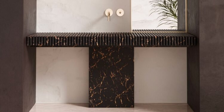 El agua desaparece por los huecos del lavabo Piano de Serafini