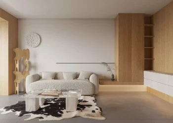 Un apartamento minimalista con paredes curvas y paneles de roble