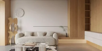 Un apartamento minimalista con paredes curvas y paneles de roble